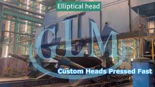 Đầu hình elip được ép bằng máy ép trống.